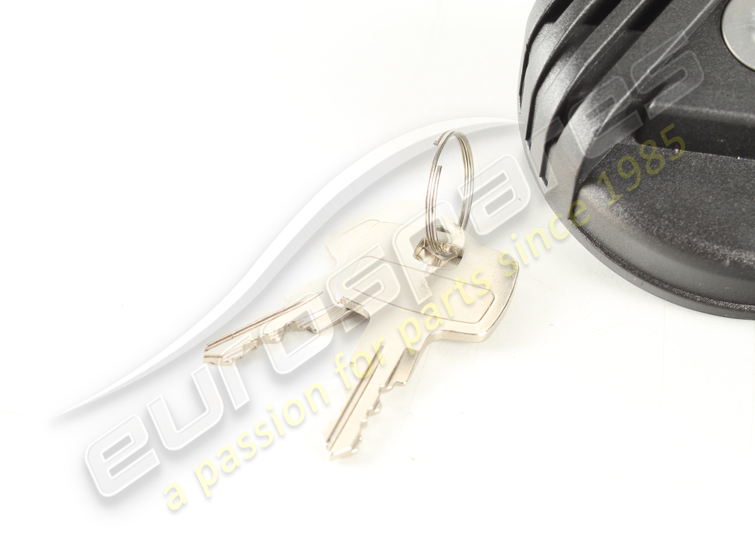 NEW LAMBORGHINI FUEL FILLER CAP & KEY. PART NUMBER 006220985 (2) new lamborghini fuel filler cap & key. part number 006220985 (2)