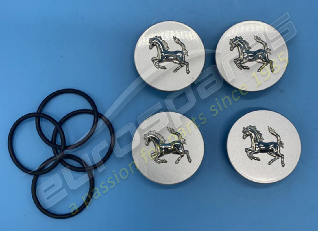 nuovo ferrari copriruota in alluminio rilevato con cavallo su grigio argento. numero parte 70001349 (1)