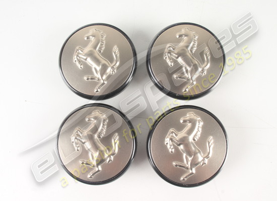 nuovo ferrari set 4 coprimozzi a spinta in titanio codice articolo 70001285