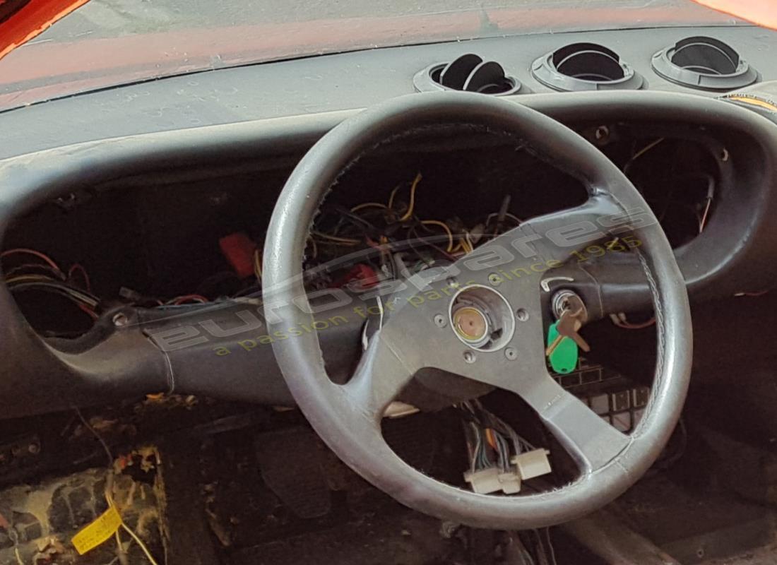 ferrari 308 gt4 dino (1976) con sconosciuto, in preparazione per lo smantellamento di #10