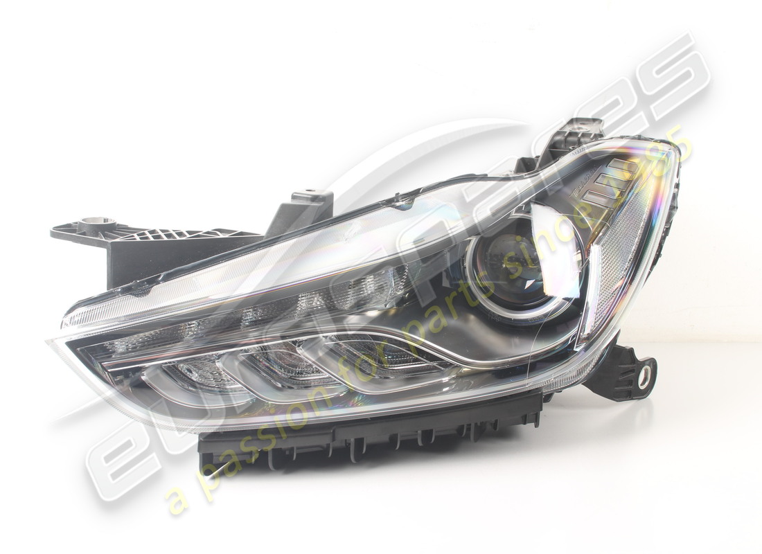 nuovo maserati faro sx. numero parte 670215130 (1)