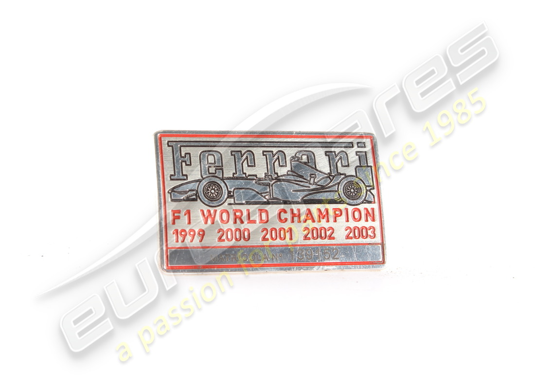 MOTIVO TARGA CAMPIONE DEL MONDO Ferrari 2003 USATO. NUMERO PARTE 68124210 (1)