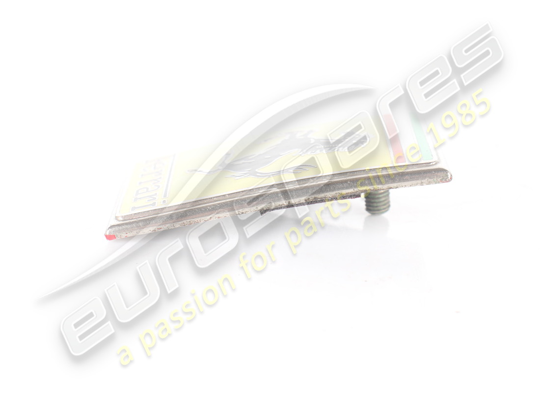 EMBLEMA ADESIVO FERRARI DANNEGGIATO. NUMERO PARTE 60795400 (2) emblema adesivo ferrari danneggiato. numero parte 60795400 (2)