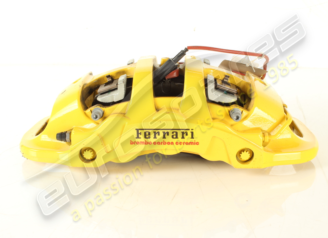 PINZA ANTERIORE SX USATA Ferrari CON PASTIGLIE. NUMERO PARTE 322140 (1)